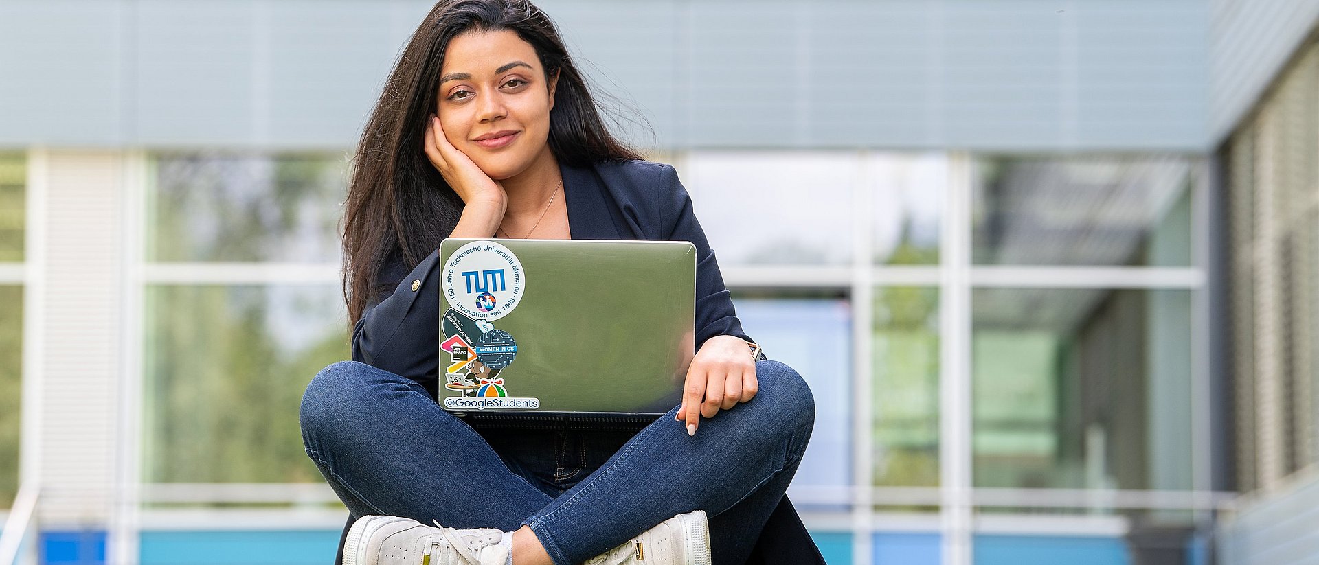 TUM student Roeya Khlifi with laptop 