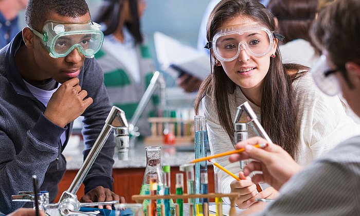 Students working with laboratory equipment