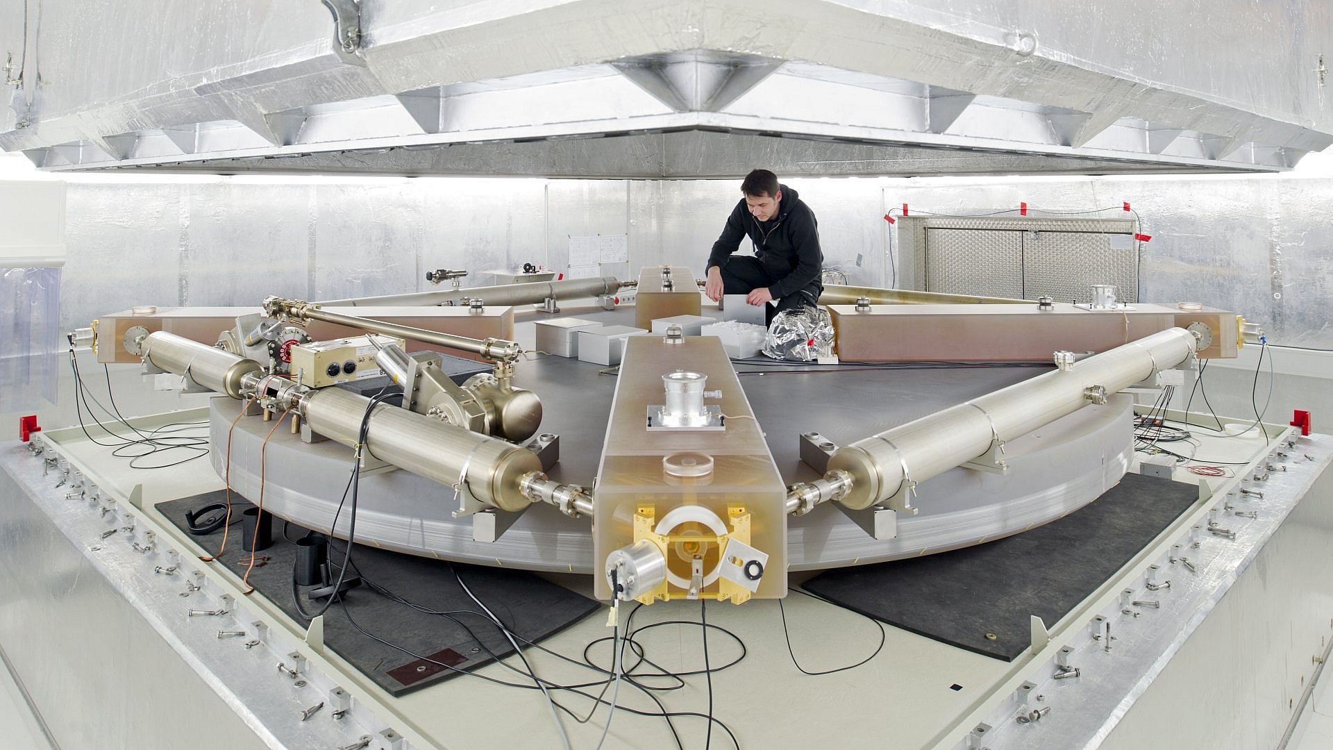 A man works on a ring laser.