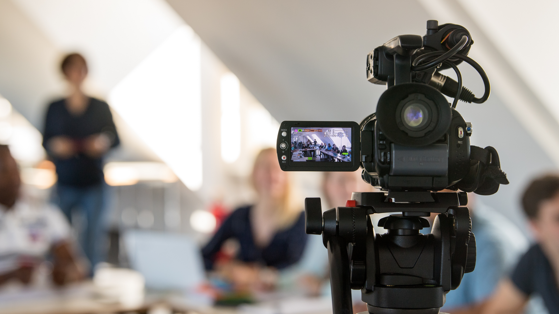 Photo of a running video camera recording a lesson