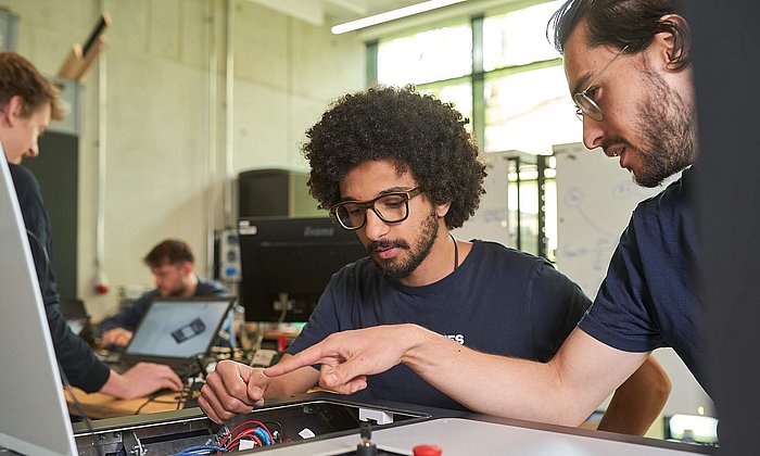 Two male researchers from the Venture Lab Robotics