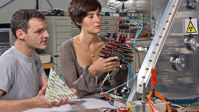 Physicists discussing research