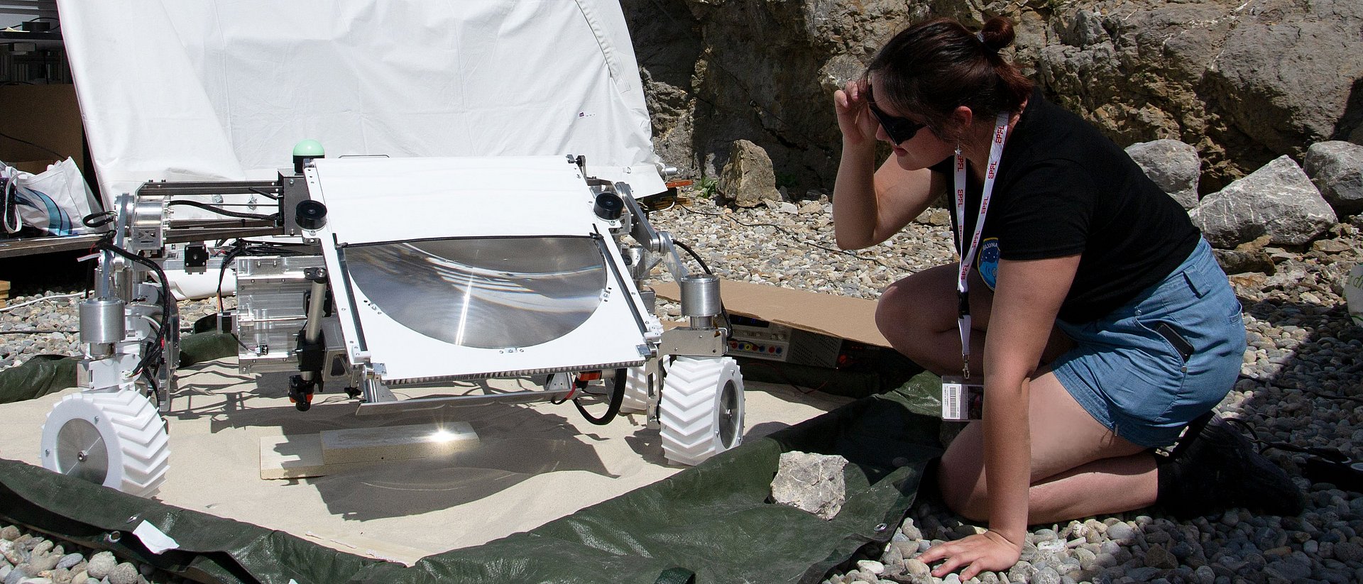 TUM student Laura Bauer with rover LARSS