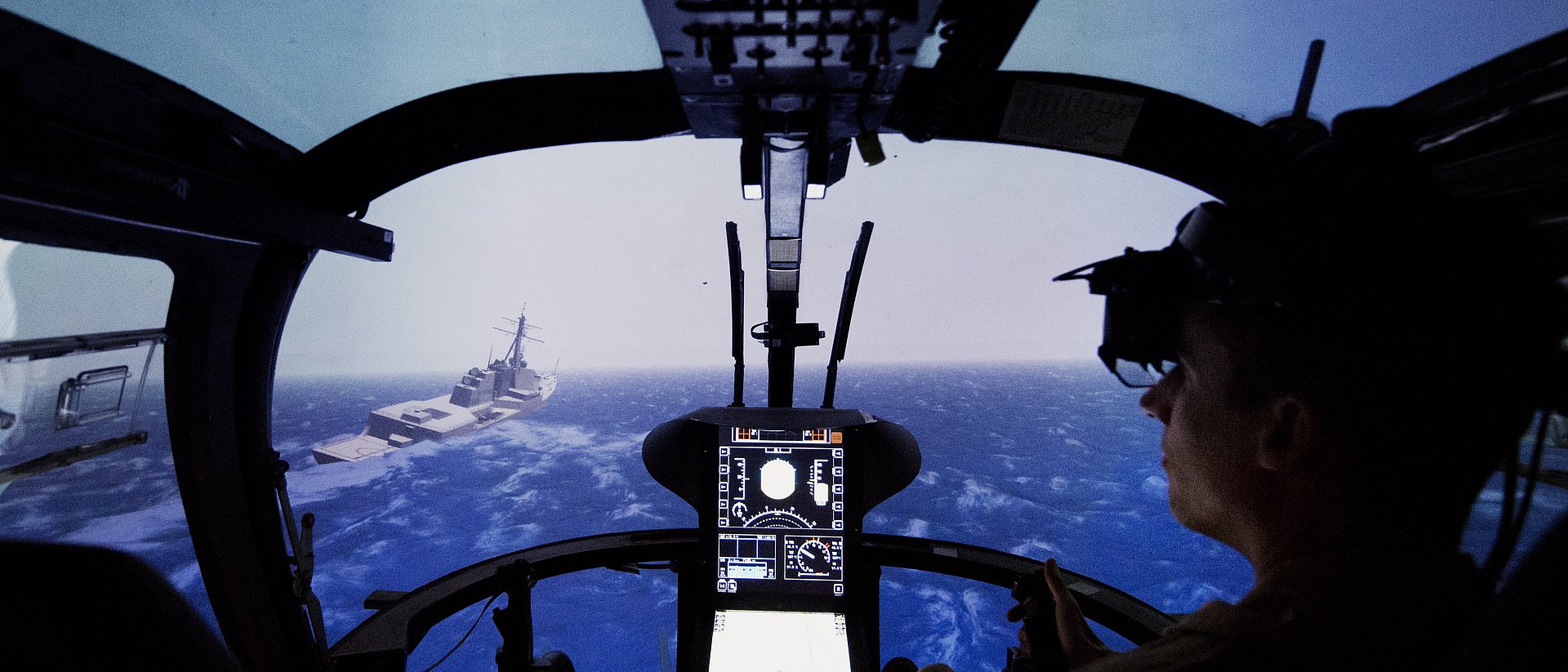 Landing approach to a ship in the helicopter simulator.