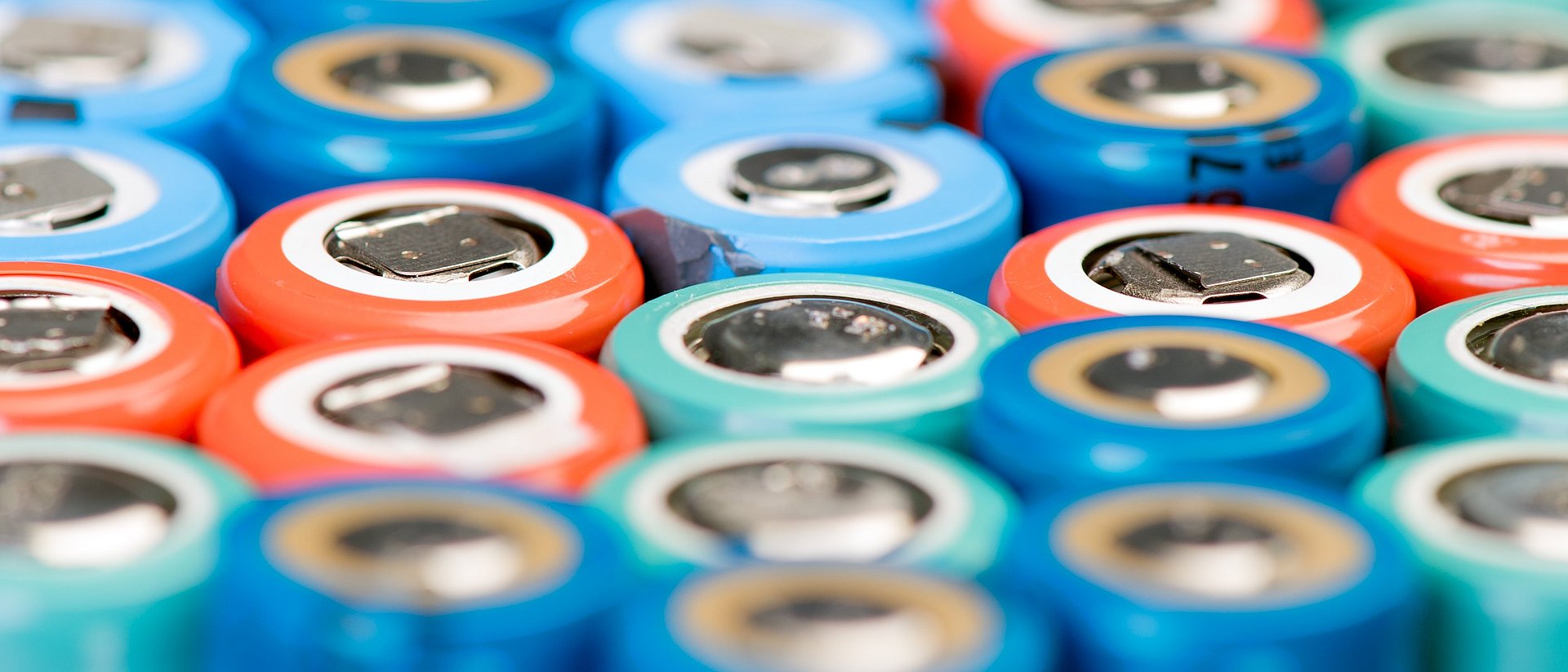 The picture shows Lithium-ion batteries in different colours.