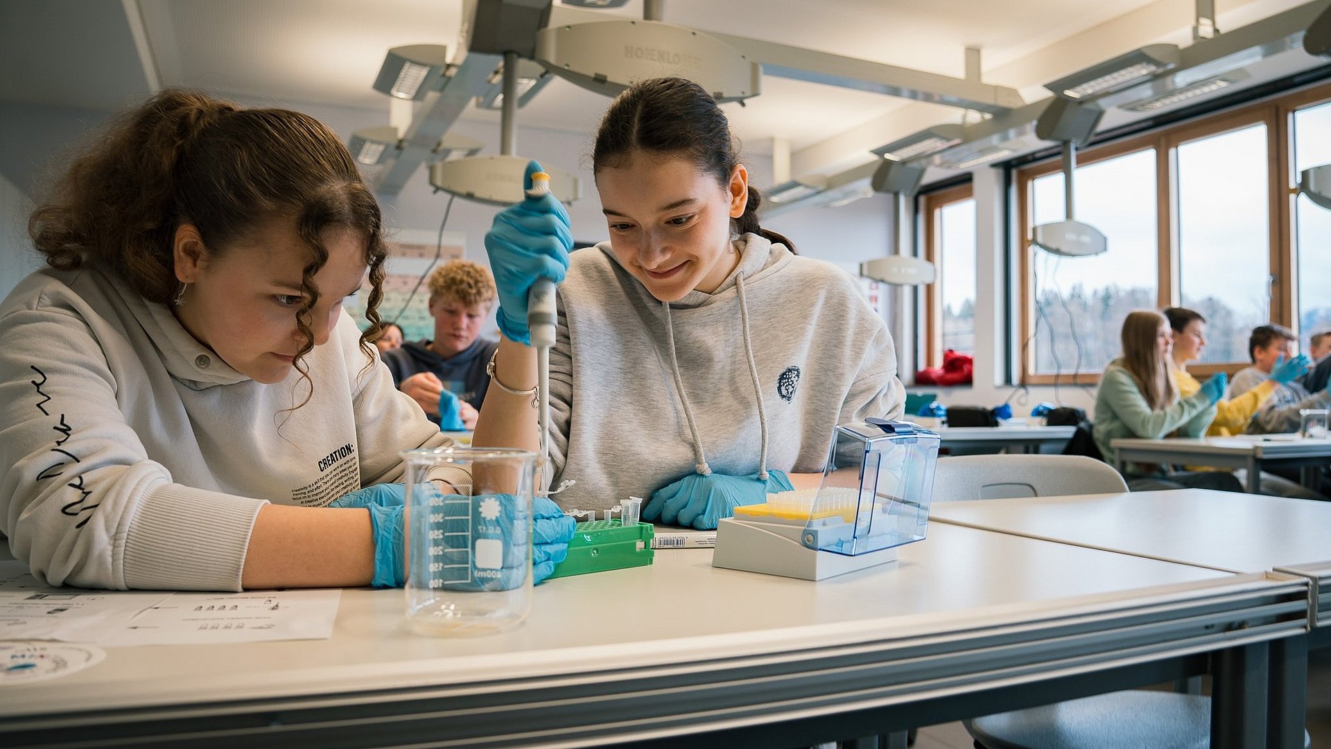 Two girls conducting an experiment at MINTopolis
