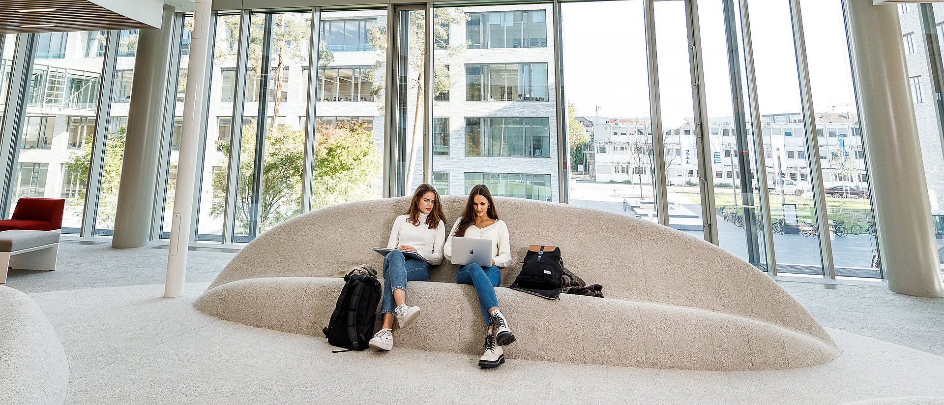 Students in the library at the Heilbronn campus