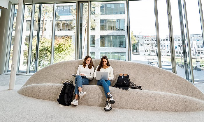 Students in the library at the Heilbronn campus