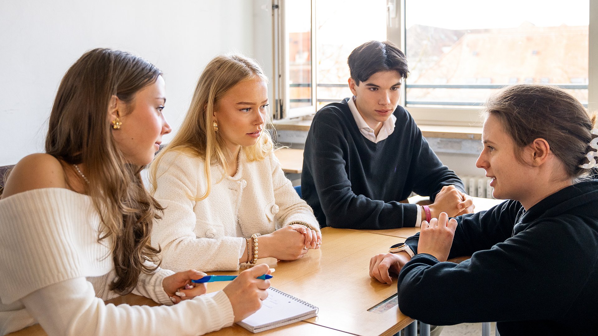 Students take financial literacy workshops to schools