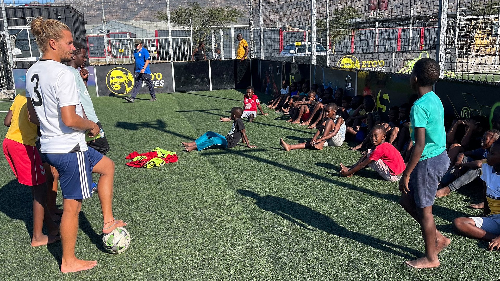 Christopher Chvalina with football students during training.