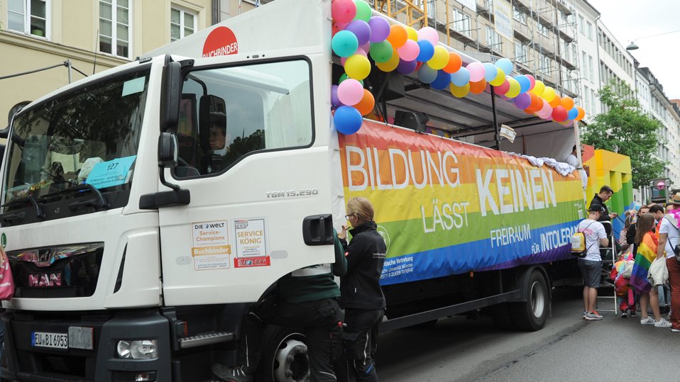 Truck with banner of TUM