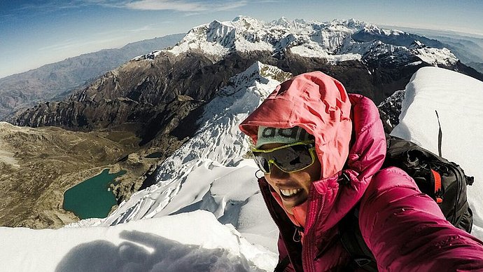 Laura Dahlmeier on a mountain top