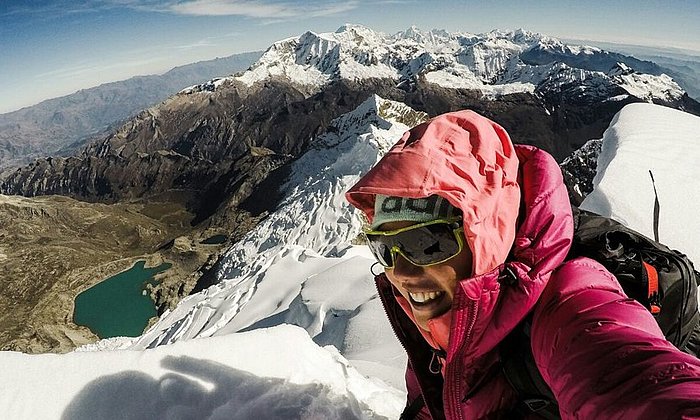 Laura Dahlmeier on a mountain top