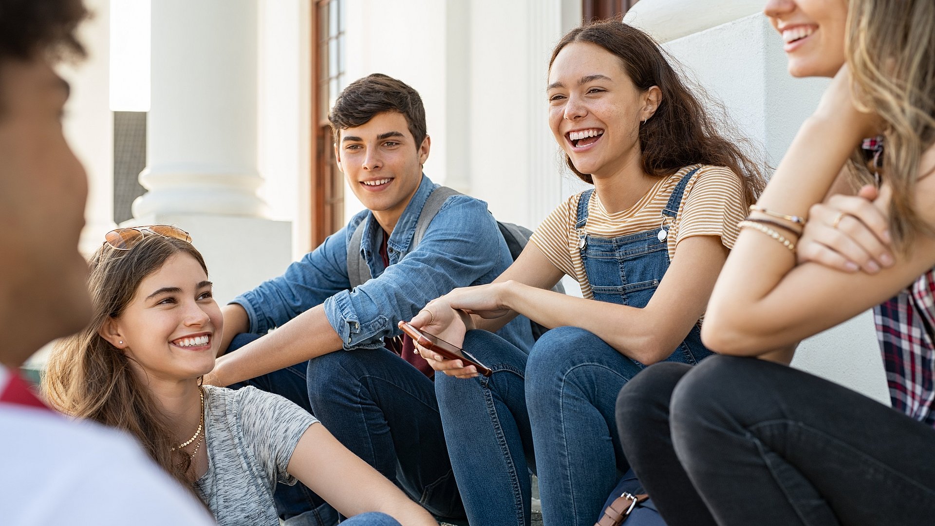 a group of young people talking