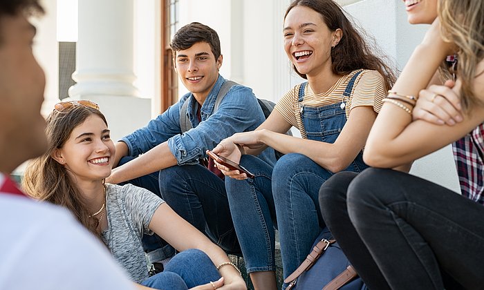 a group of young people talking