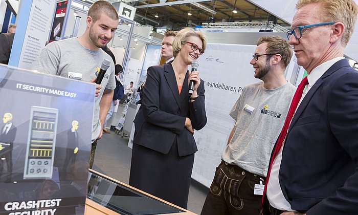 Federal research minister Anja Karliczek attending a demonstration of the Crashtest Security software at CEBIT.