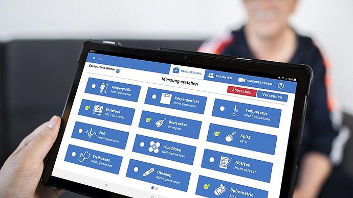 A tablet PC running telemedicine software A tablet PC running telemedicine software