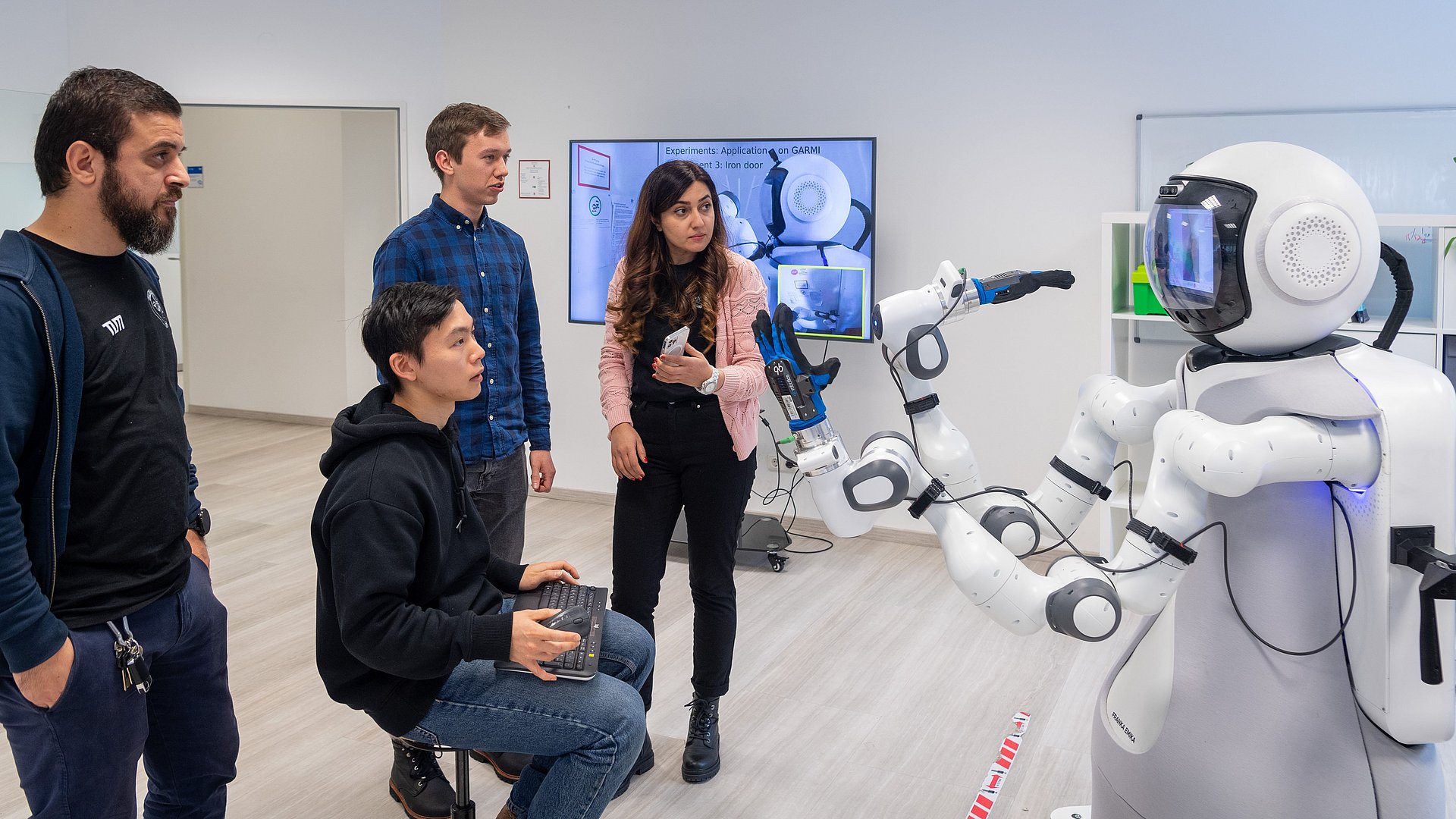 Researchers test new capabilities of the care robot GARMI.
