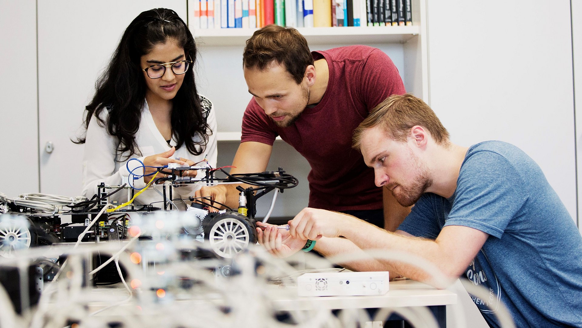 University Impact Ranking Researchers in a laboratory