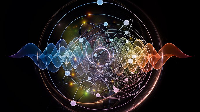 Abstract concept of atom and quantum waves illustrated with fractal elements. 