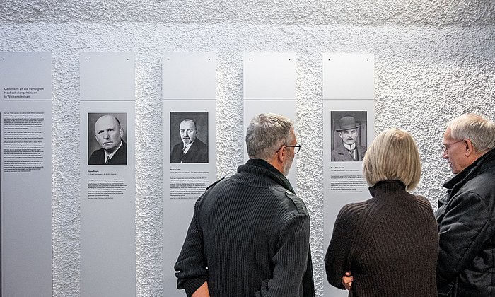 Guests of the opening viewing the information panels