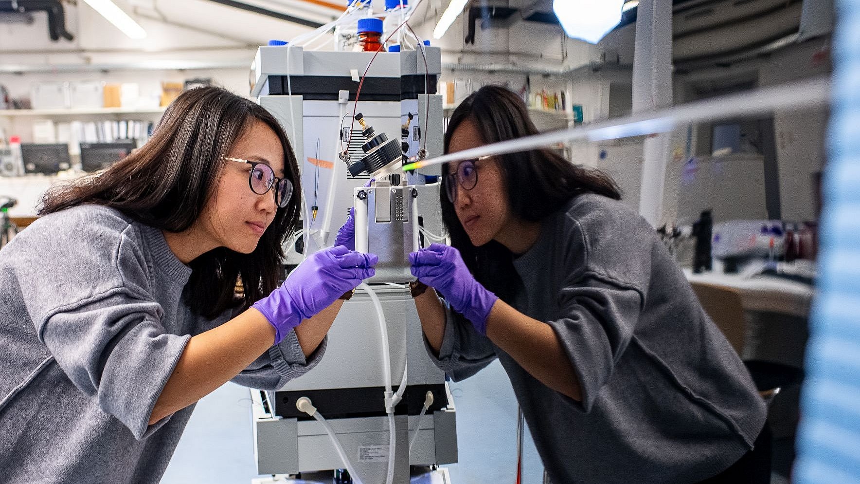A student working on the mass spectrometer A student working on the mass spectrometer