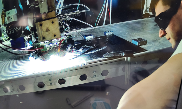 Light helps a 3D printer to better bond print layers together.