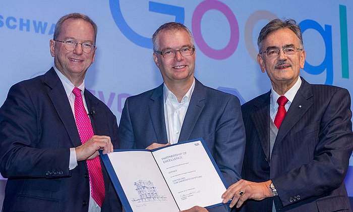 Eric Schmidt, Wieland Holfelder from Google Munich and TUM President Wolfgang A. Herrmann