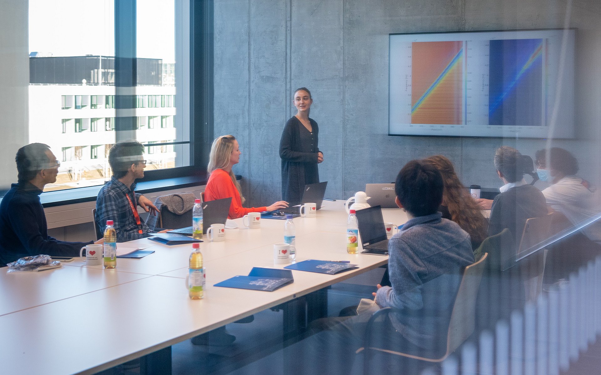 Students and researchers in a lecture room