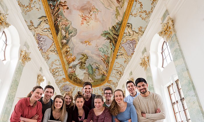 Group of students in front of the renovated ceiling painting in the TUM Academy Center Raitenhaslach