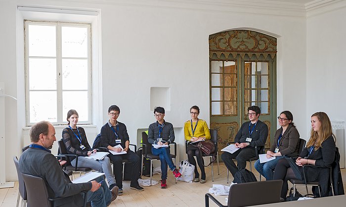 Doctoral candidates during a seminar.