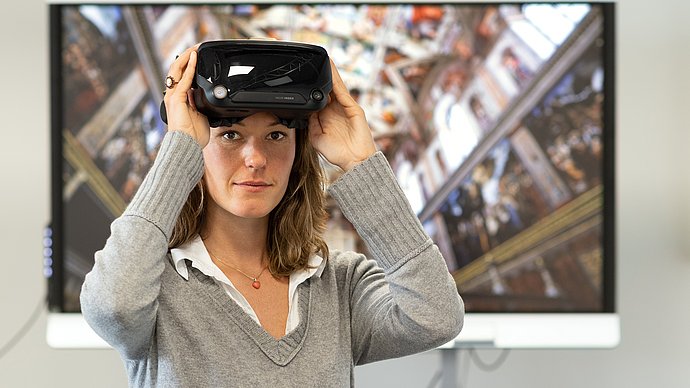 Researcher with VR glasses
