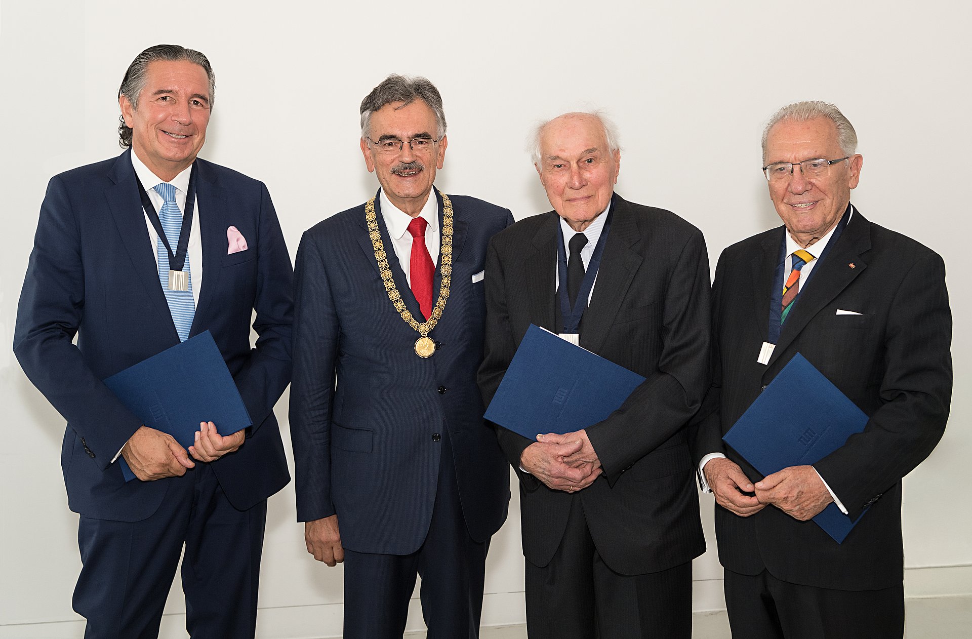 The three new honorary senators Dr. Urs Brunner, Prof. Gallus Rehm and Max Aicher (l.t.r). with TUM-president Wolfgang A. Herrmann (2.f.l.) (Picture: U. Benz / TUM)