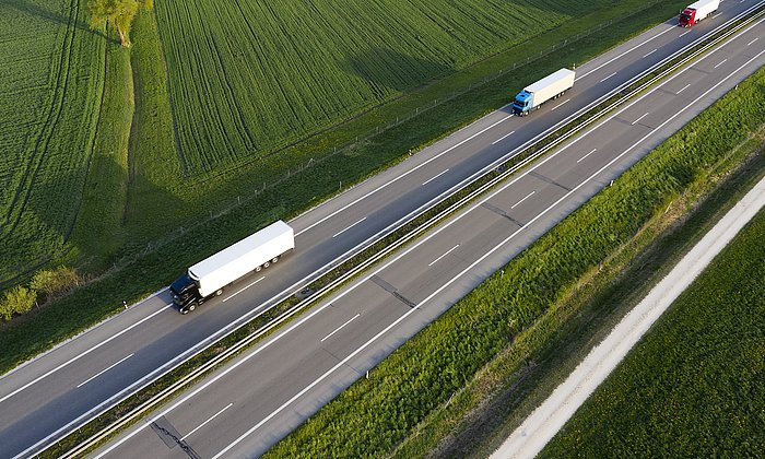 Trucks driving alone on a highway