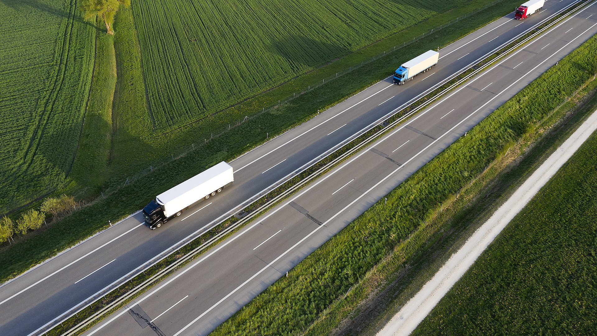 Trucks driving alone on a highway