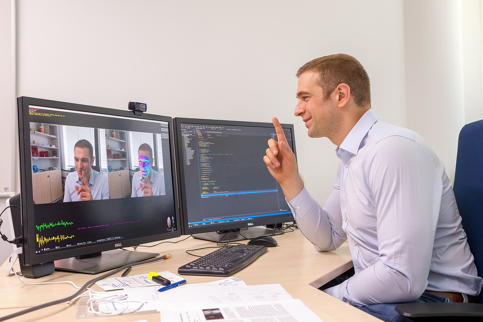 Matthias Nießner uses Face2Face to create a mask of his face so that he can replace it with the face of another person. 