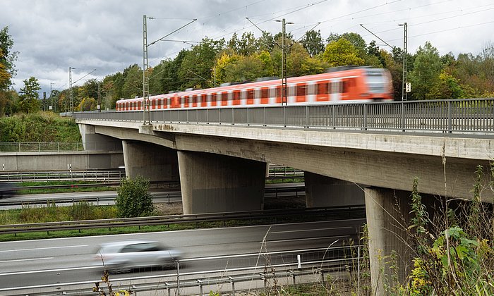 A train is crossing a railway bridge