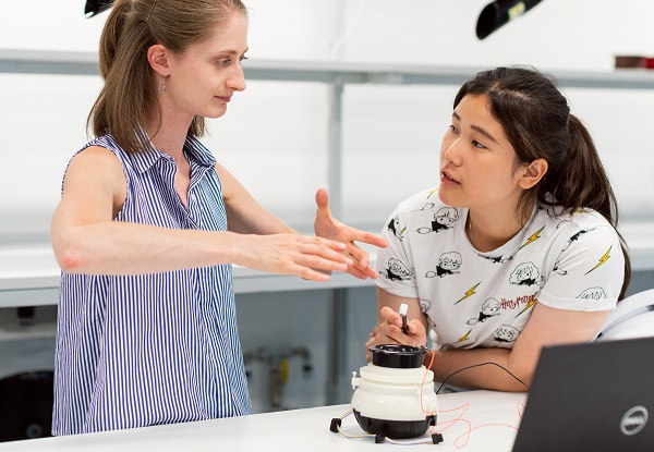 Two female students in conversation