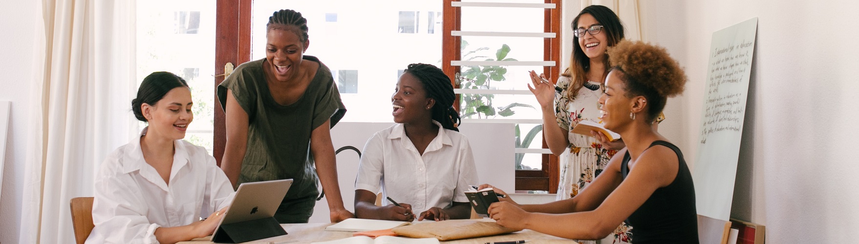 Group of students in a meeting Group of students in a meeting