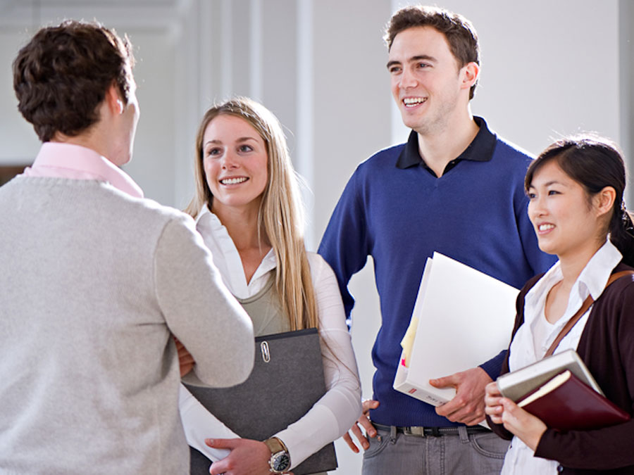 Students talking to each other.