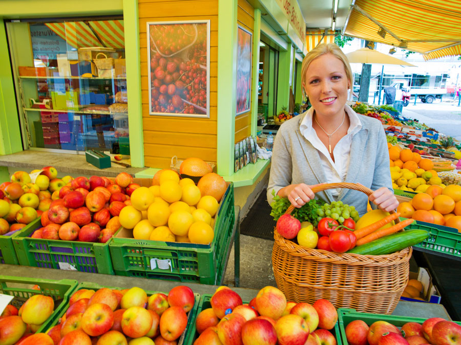 Woman at a market stand