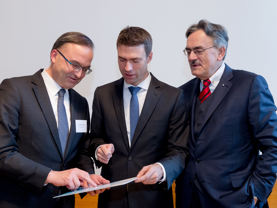 Professor Gerhard Müller, Senior Vice President - Academic and Student Affairs (left), Stefan Müller, Parliamentary State Secretary (center), and  Prof. Wolfgang A. Herrmann