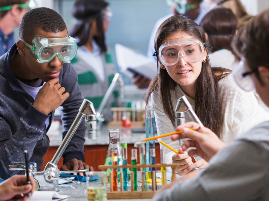 Students working with laboratory equipment