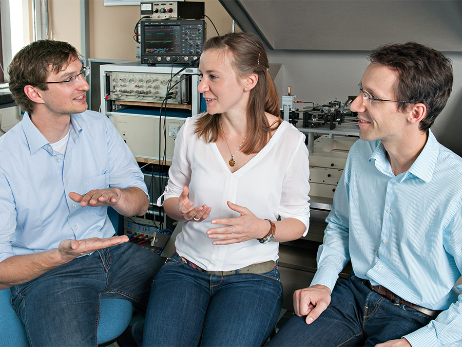 Magnetic-computing research team at TUM: from left, Stephan Breitkreutz, Irina Eichwald, Markus Becherer. Photo: U. Benz/TUM