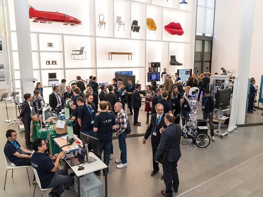 Science projects among design object: Several of TUM's robotics research groups presented their projects at Pinakothek der Moderne. (image: U. Benz / TUM)