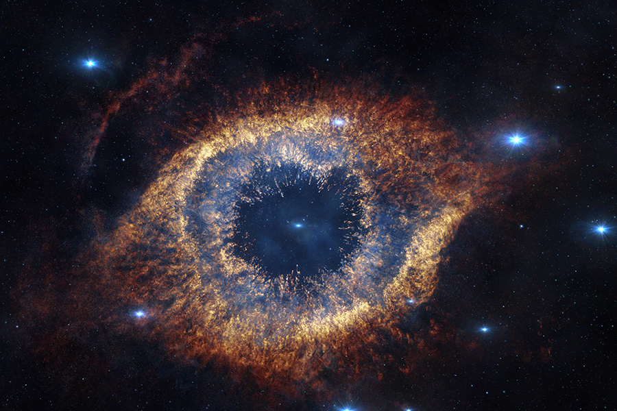 The Helix Nebula, 700 light-years away from Earth. The ORIGINS Cluster of Excellence looks into the origins of both life and the universe itself.  (Image: ESO/VISTA/J. Emerson)
