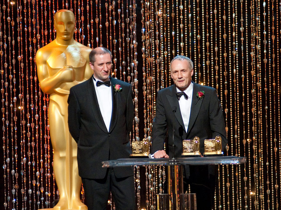 Prof. Dr. Reimar Lenz bei der Preisverleihung an einem Podium.