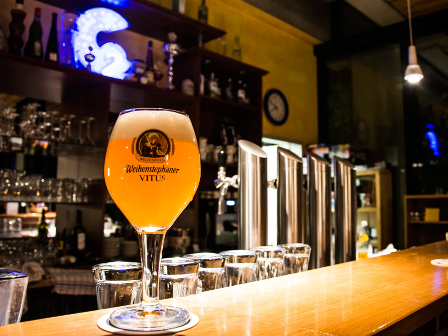 Glass of beer on counter